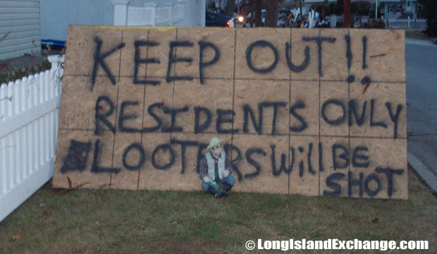 Another spray-painted warning message threatening thugs and looters to "Keep Out, Residents Only".