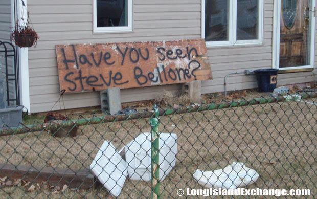 Frustration is evident in a message spray-painted on fallen wood "Have you seen [Executive] Steve Bellone?".