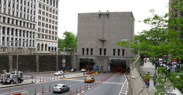 Looking south from pedestrian overpass on a cloudy afternoon at Brooklyn Battery Tunnel Manhattan entrance.