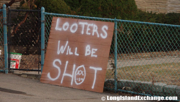 A warning message to keep away thugs and looters on a street in Lindenhurst, N.Y. on November 18, 2012.