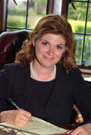 Attorney Elizabeth Kase of Port Washington provides pro bono legal representation in these difficult situation. For her long commitment and  dedication in handling these special cases, Nassau County Bar Association President Peter J. Mancuso has named Elizabeth Kase Pro Bono Attorney of the Month for January 2014.