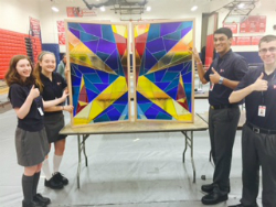 Stained Glass Window Gifts Installed at St. John the Baptist Diocesan High School. Photo Credit: SJTB.