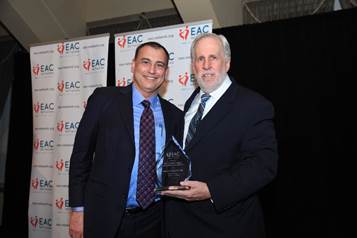 Honoree Joseph A. Quatela receives the Steven J. Eisman Humanitarian Award from Lance W. Elder. Photo Credit: EAC.